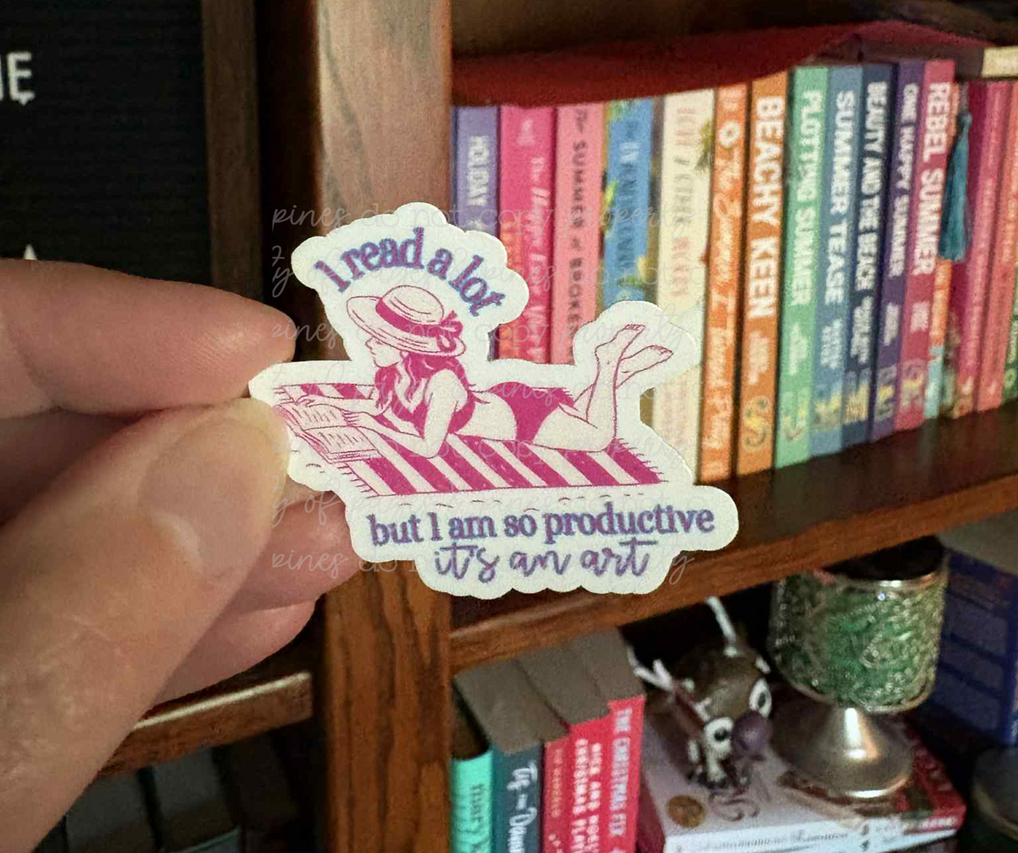 I Read A Lot But I Am So Productive It's An Art--Pink (sticker)