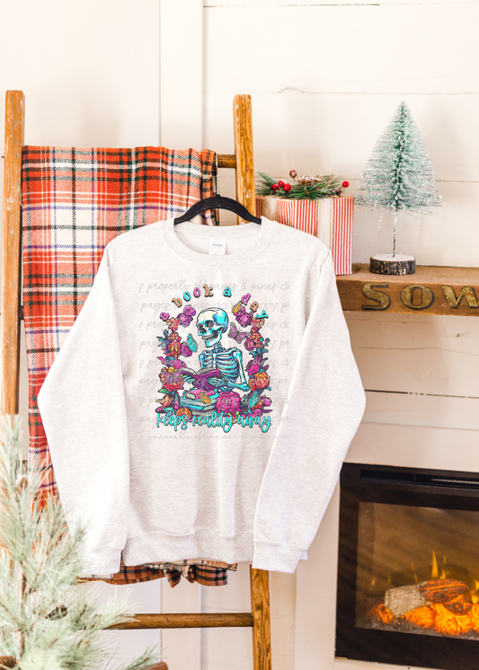 A Book a Day Keeps Reality Away